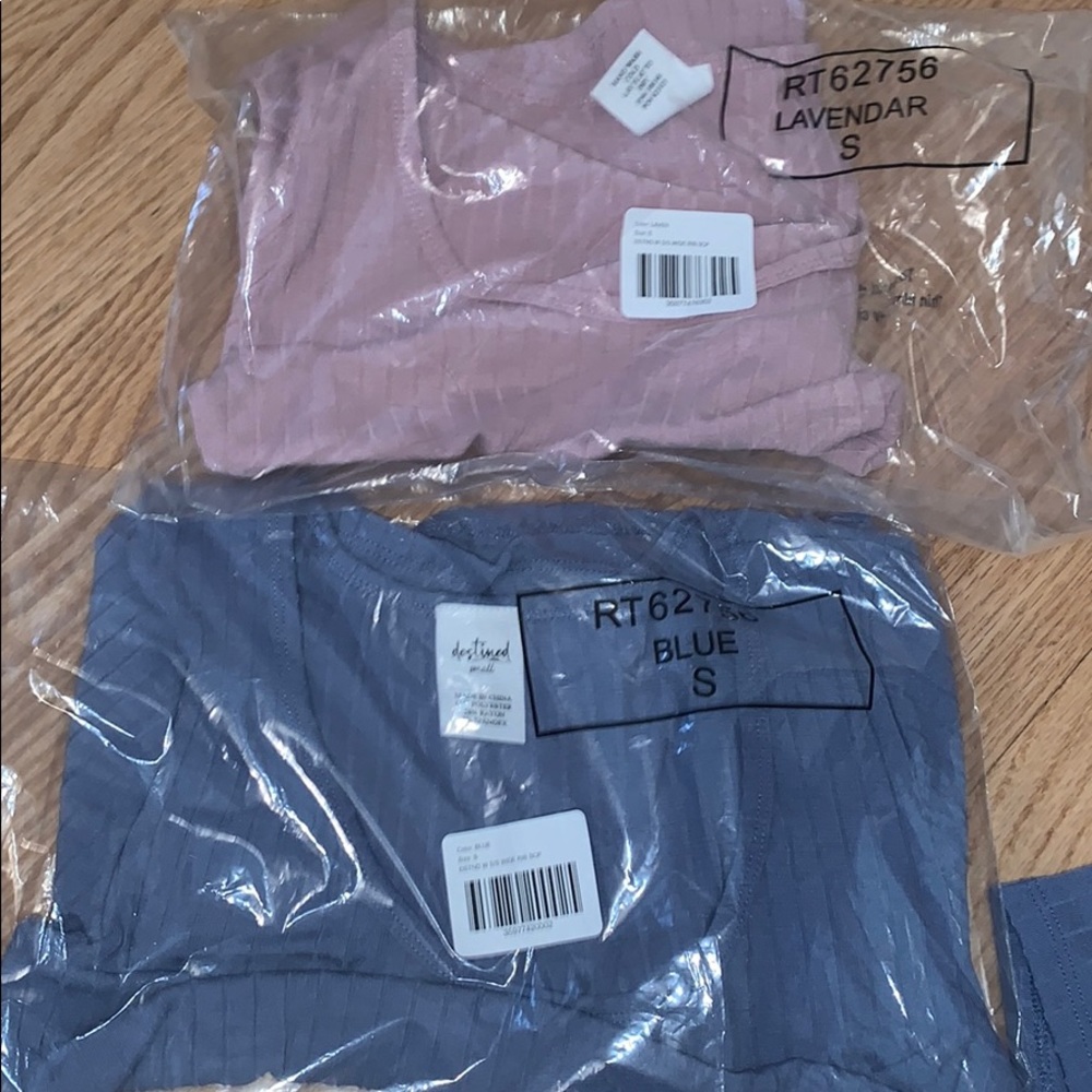 One pink crop top and one blue crop top